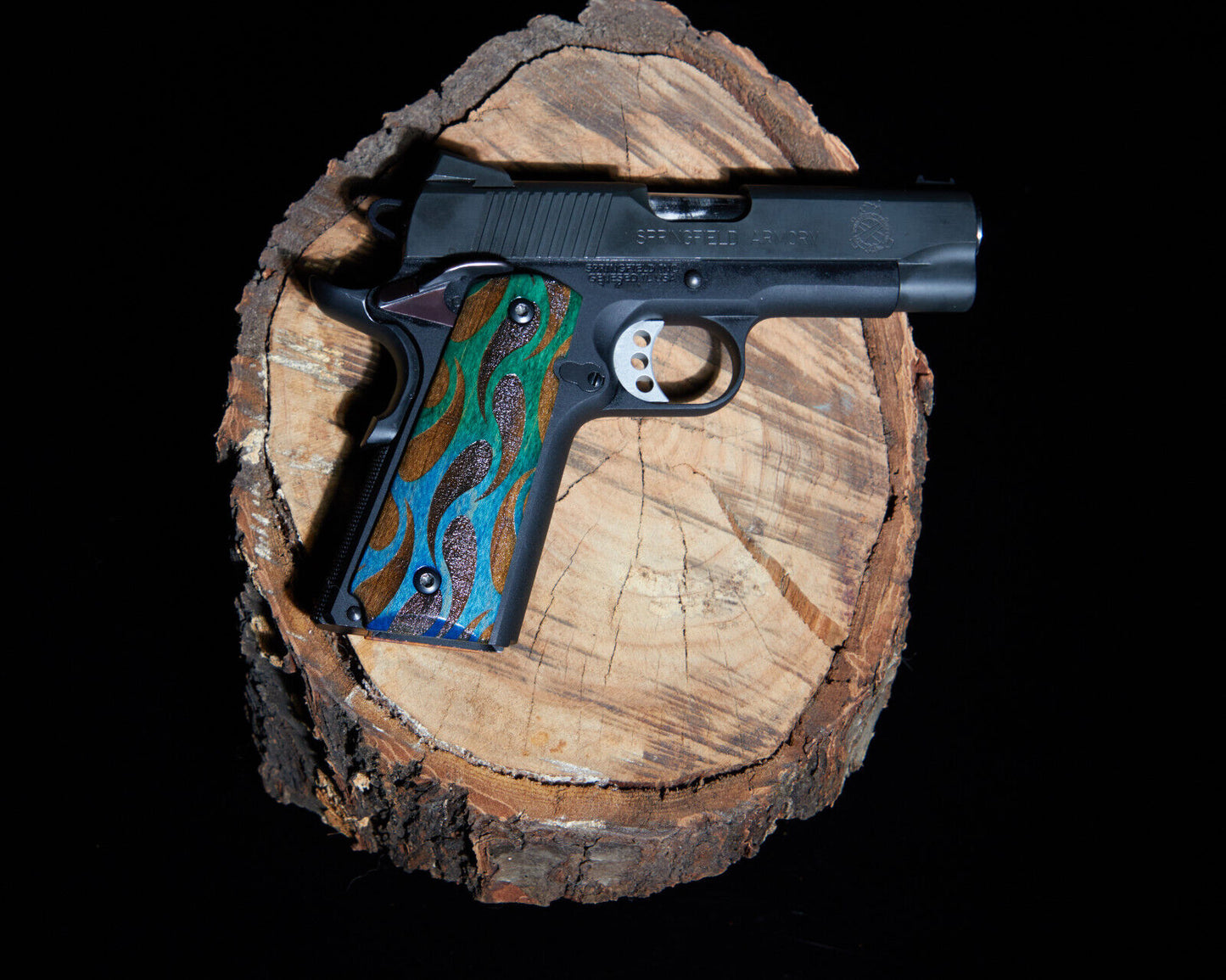 1911 grips Maple wood with laser etched pattern. Green faded to Blue